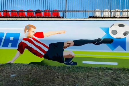 Najdłuższy grodziski mural na ścianach stadionu Pogoni. Tak wygląda - Grodzisk News